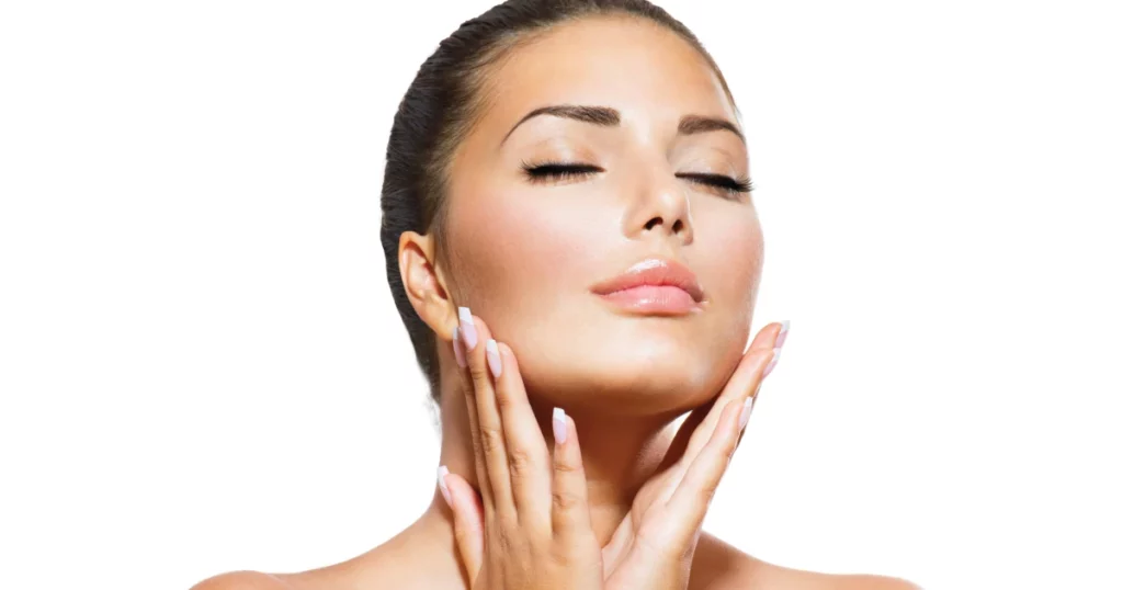 Woman showing smooth, defined chin after Kybella treatment in Salt Lake City, UT